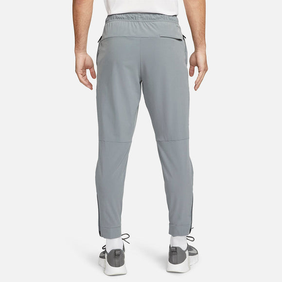 NIKE AS M NK DF UNLIMITED PANT TPR FB7549-084 PANT TRAINING (M)